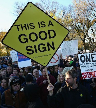 Giant Good Sign in the Rally crowd